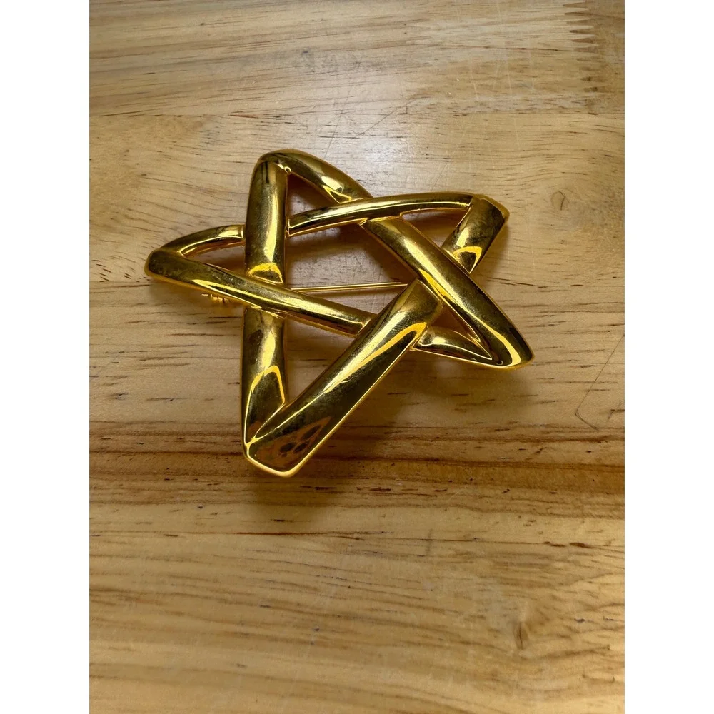 Yves Saint Laurent type brooch